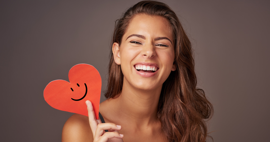 The purpose of an image featuring a lady holding a heart with a smiley face is to visually represent the concept of always choosing happiness. This image symbolizes the idea that happiness is a choice and highlights the positive impact of making that choice. The smiley face on the heart conveys joy and positivity, while the lady holding it signifies an active decision to embrace happiness. This visual can inspire readers to adopt a happiness-focused mindset and remind them that they have the power to choose happiness in their own lives.